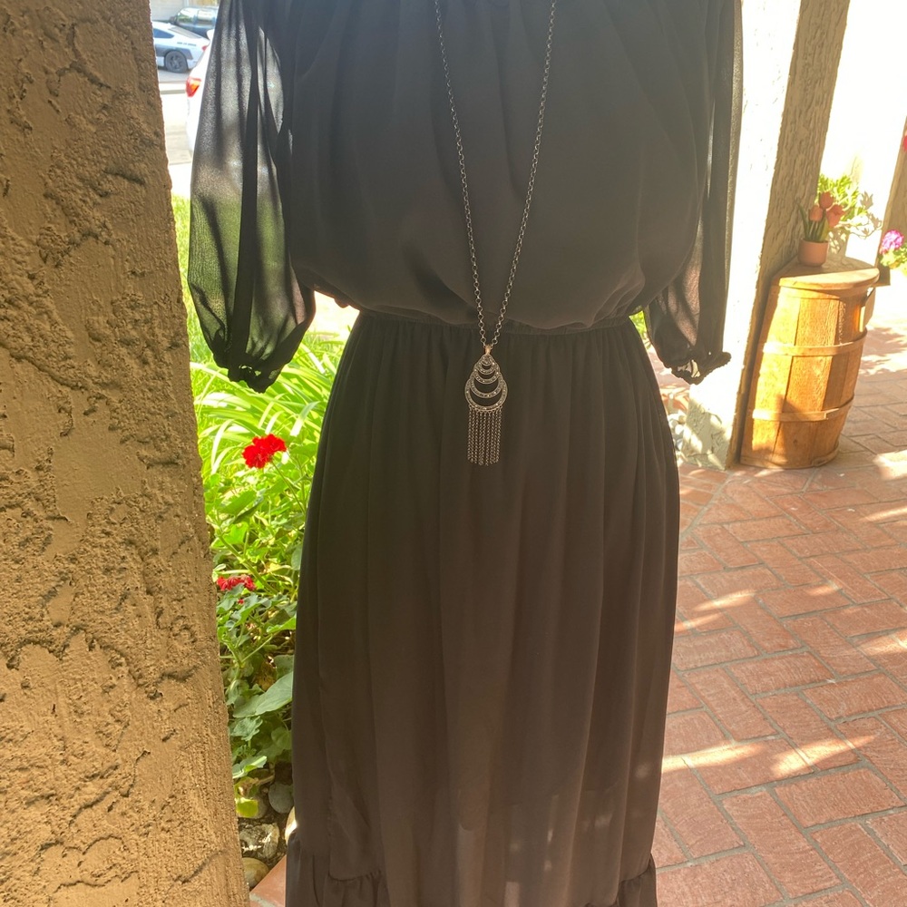 Elegant Black Dress with Sheer Sleeves